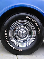 New_Tires_w_New_Rotors_peeking_thru.jpg