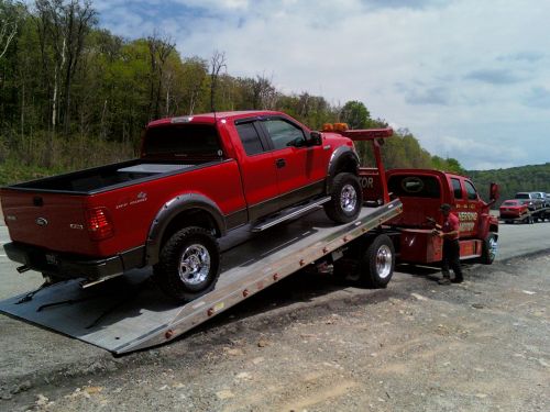 Name:  truck_being_towed_on_turnpike_5-22-09.jpg
Views: 882
Size:  40.1 KB