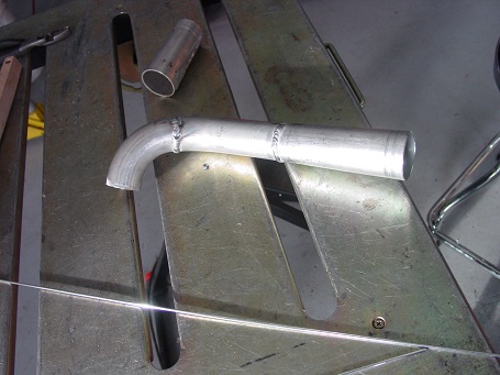 Name:  Upper Radiator Pipe on the bench.jpg
Views: 1507
Size:  60.1 KB