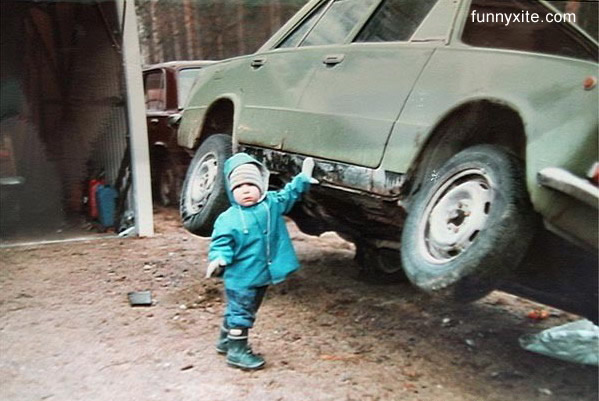 Name:  man lifting car.jpg
Views: 12483
Size:  70.4 KB